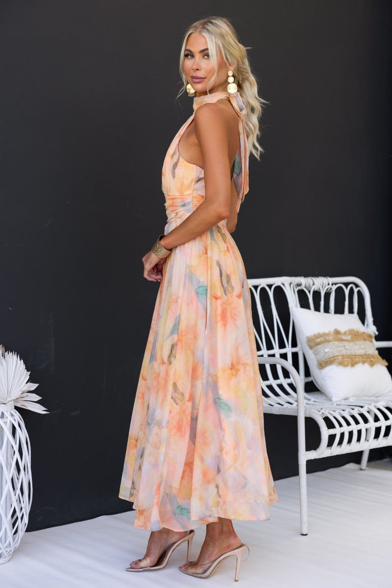 Luchi™ | Vestido maxi floral con escote halter